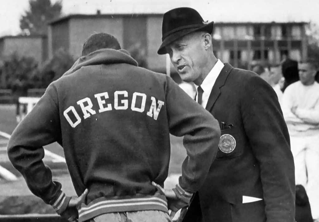 Bill Bowerman with an Oregon track athlete circa 1969