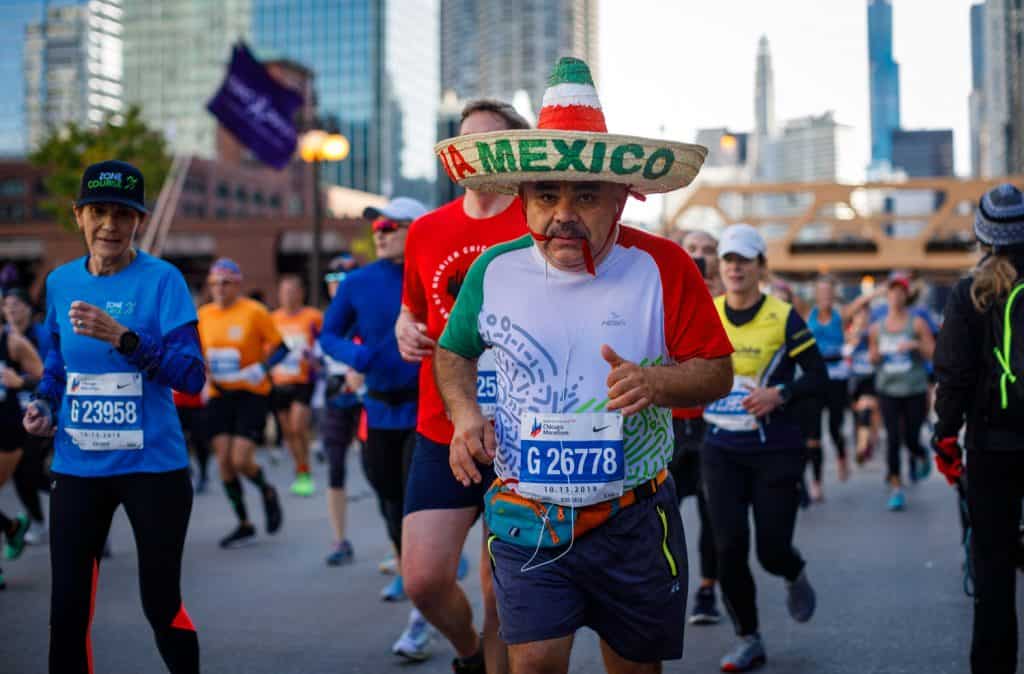 Man in Mexico hat running in Chicago
