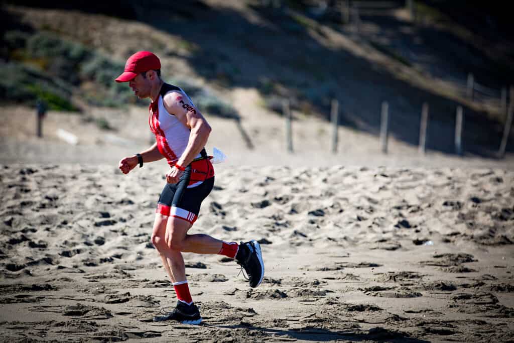 Runner at the beach during Escape from Alcatraz triathlon