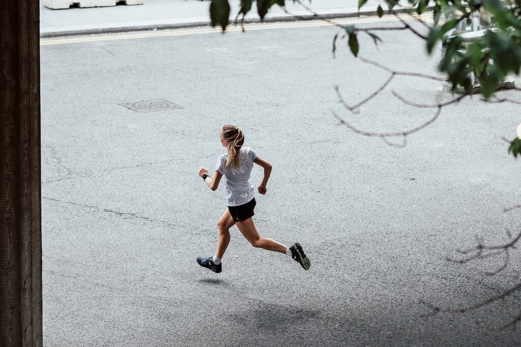 woman marathon runner on the street