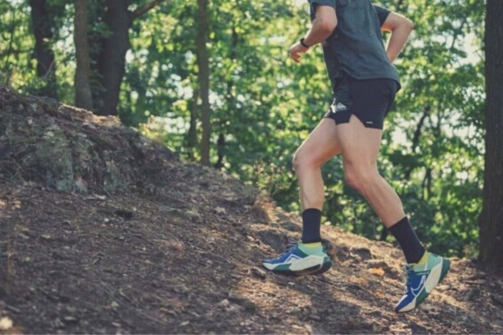 a male runner on a trail wearing Nike ZoomX Zegama