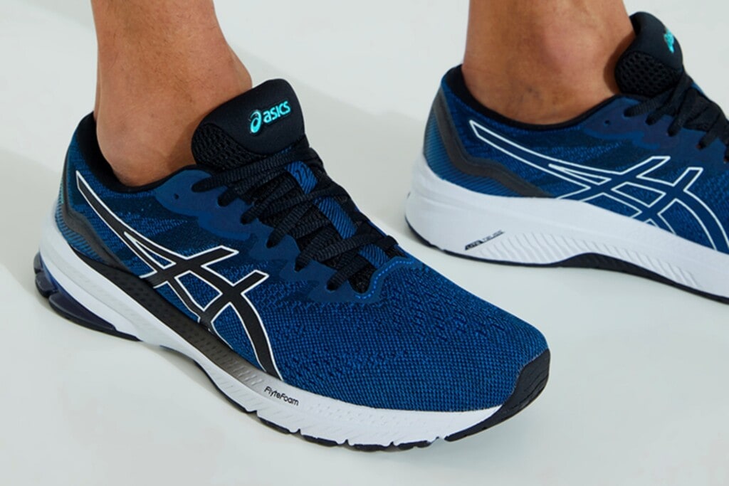 Asics GT 1000 11 road running model with medial side support