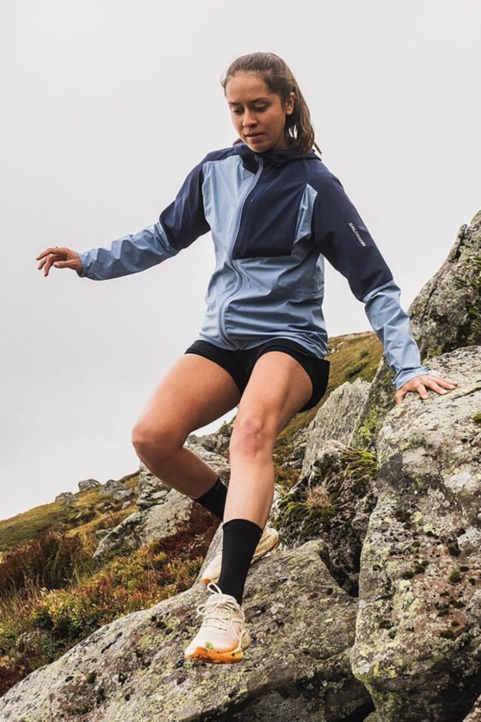 Woman wearing Salomon trail running shoes