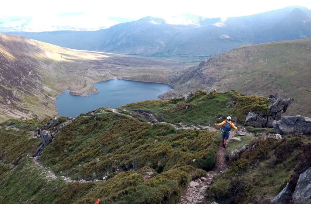 runner descending a rocky path on Ultra Trail Snowdonia by UTMB