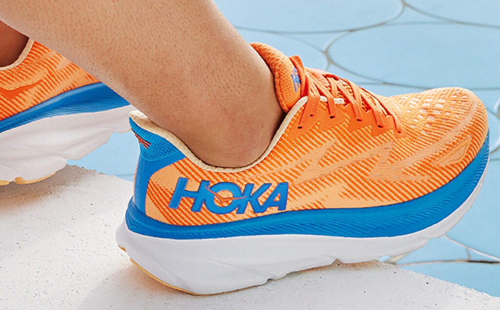 Hoka Clifton 9 on feet with moderate arch support