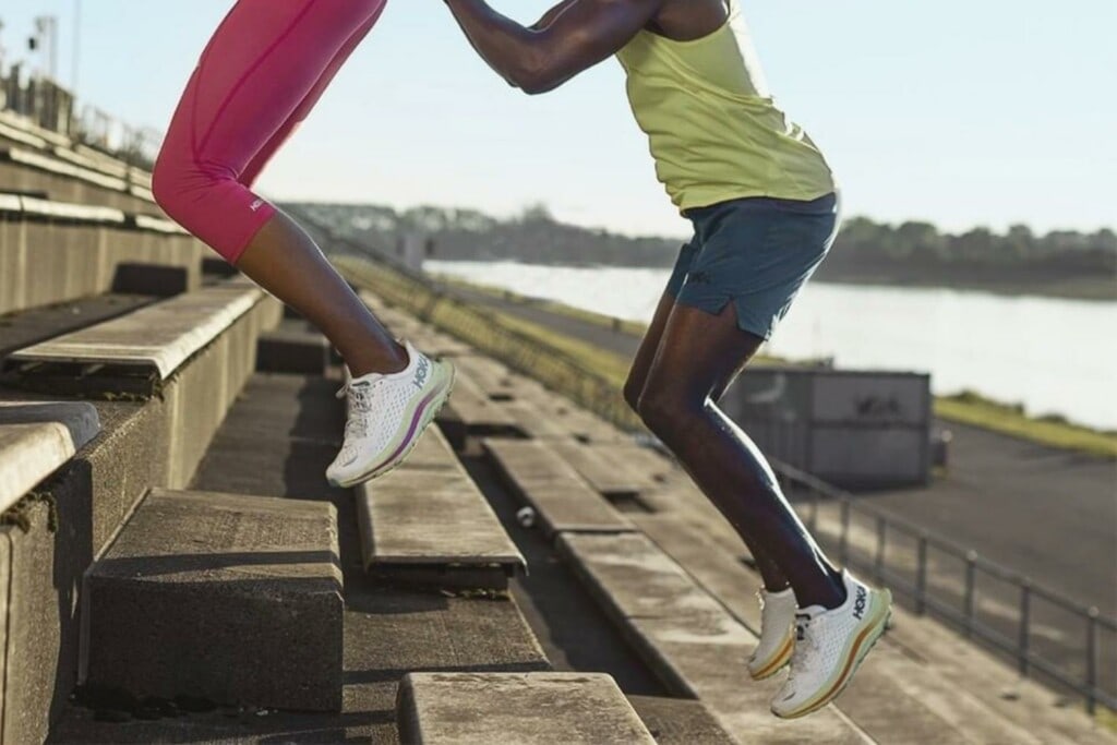 runners training wearing Hoka Kawana running shoes