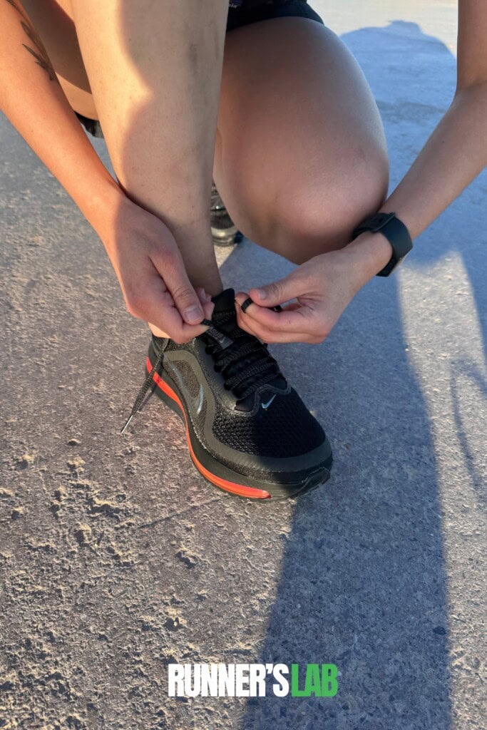 runner tying laces of Nike Pegasus premium shoes