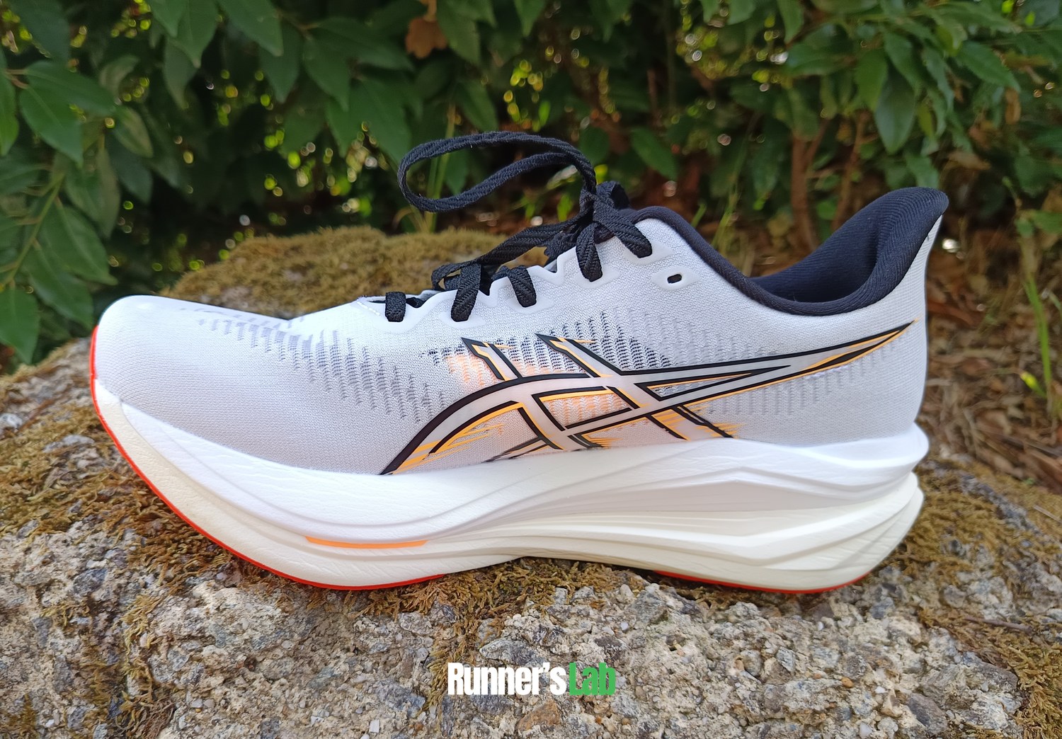 Asics Sonicblast 2 sitting on a rock, side view