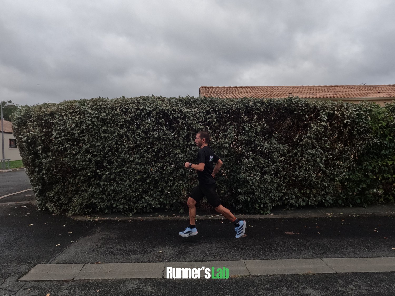 Julien running on the road in the Adidas Adios Pro 5