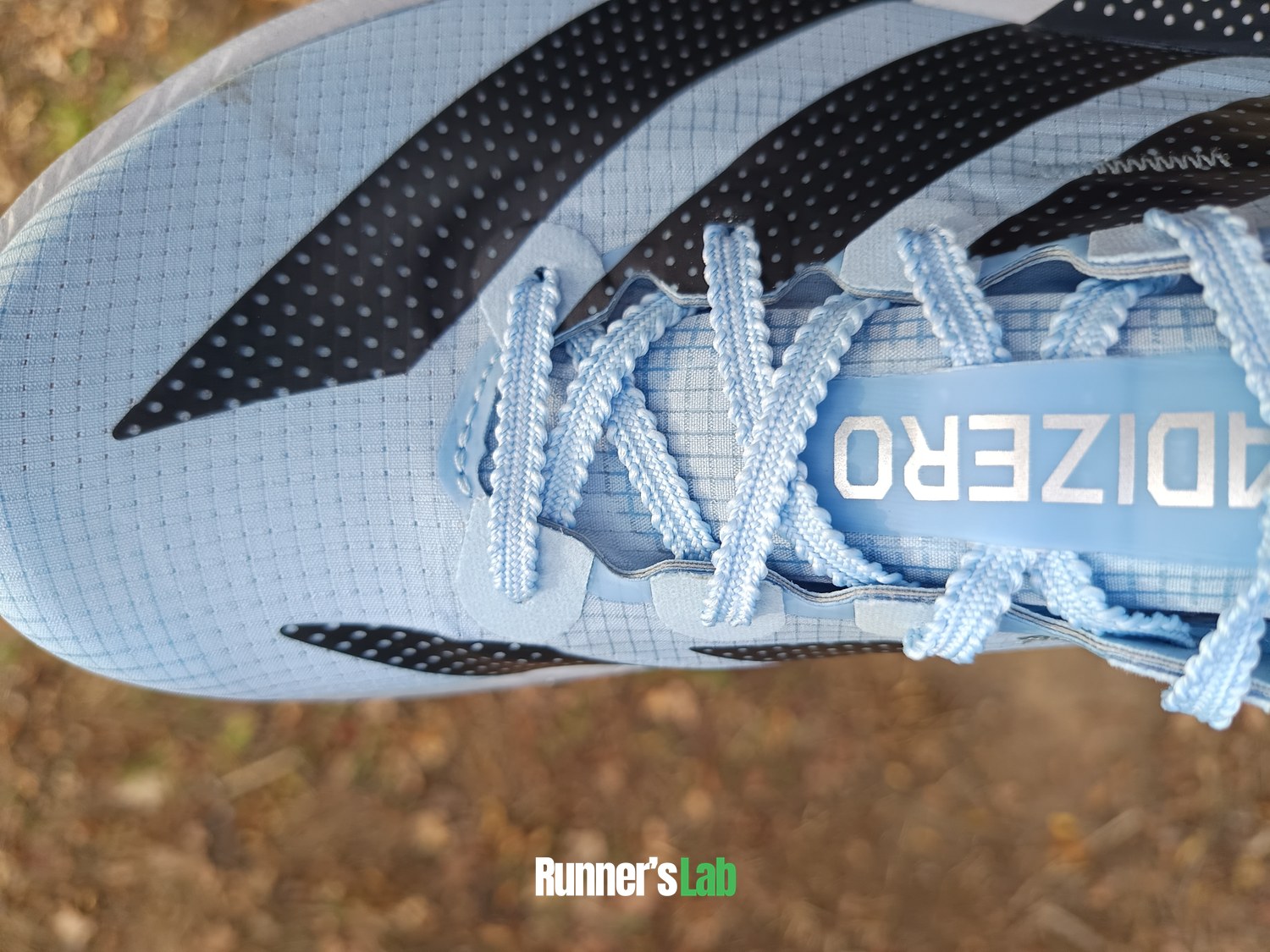 Close-up of the Lightlock 2.0 upper and lacing of the Adidas Adios Pro 5
